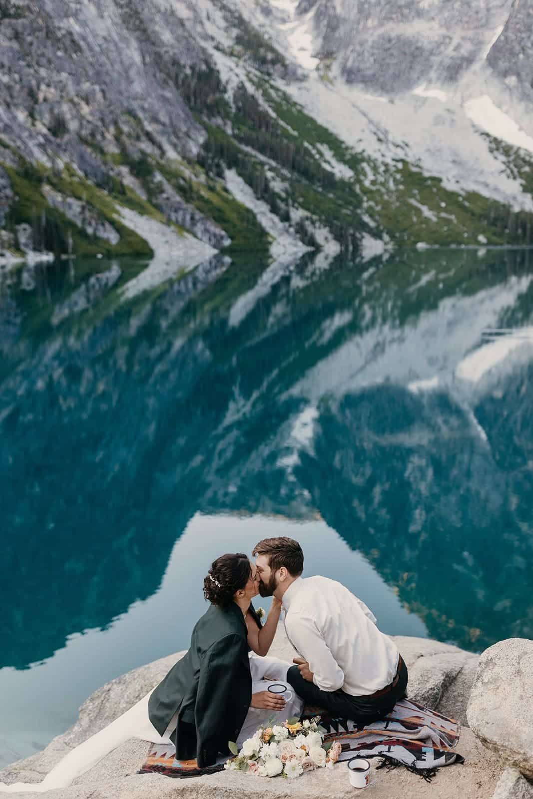 A couple shares a kiss after their elopement ceremony in Leavenworth.