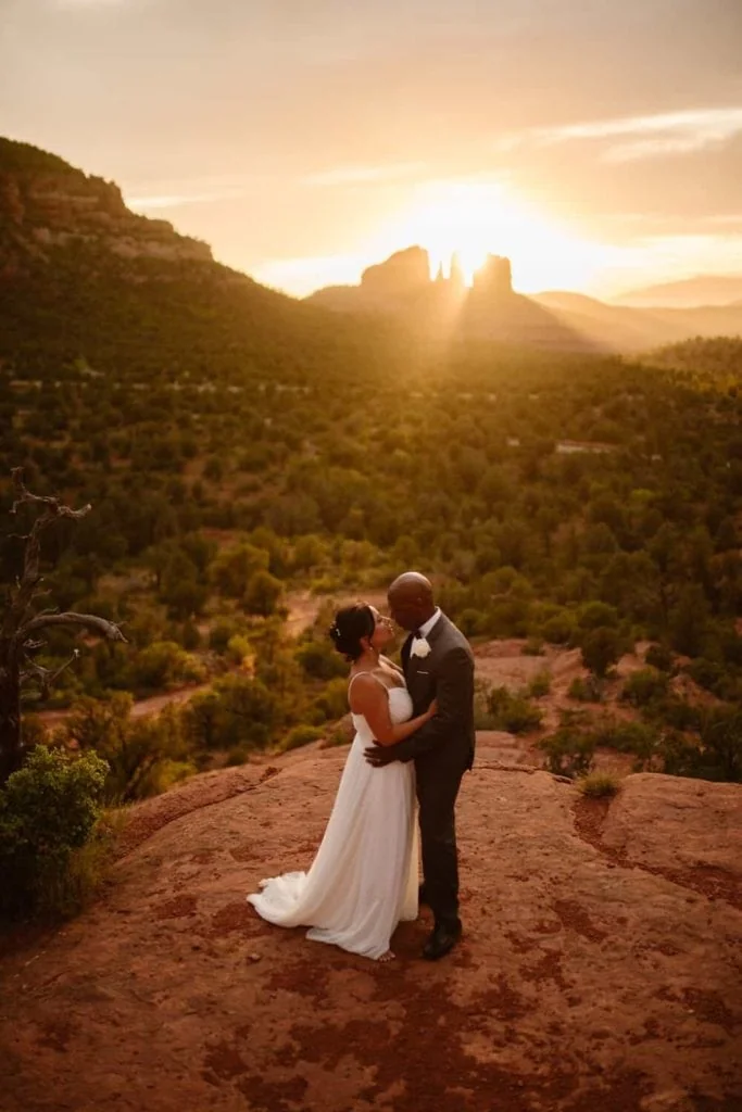 A couple dances in the sunlight at Bell Rock.