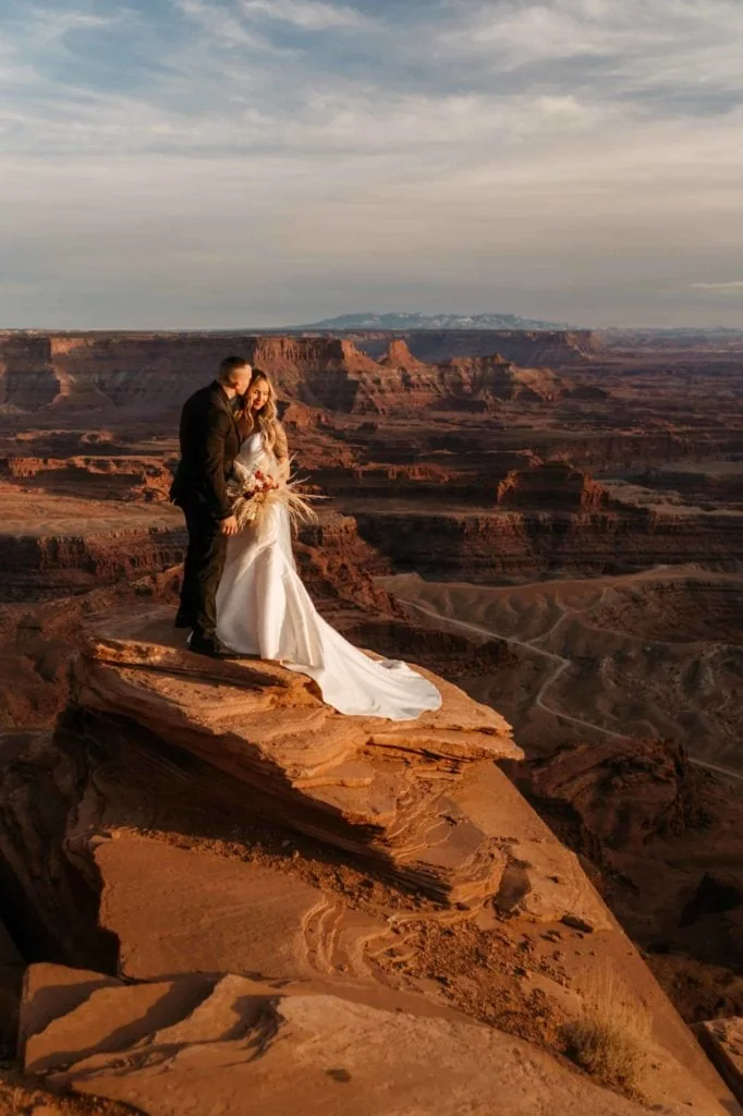 a couple overlooking the canyon.