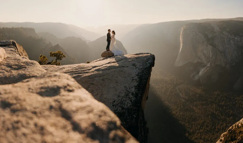 A bride and groom share their private vows at Taft Point. 
