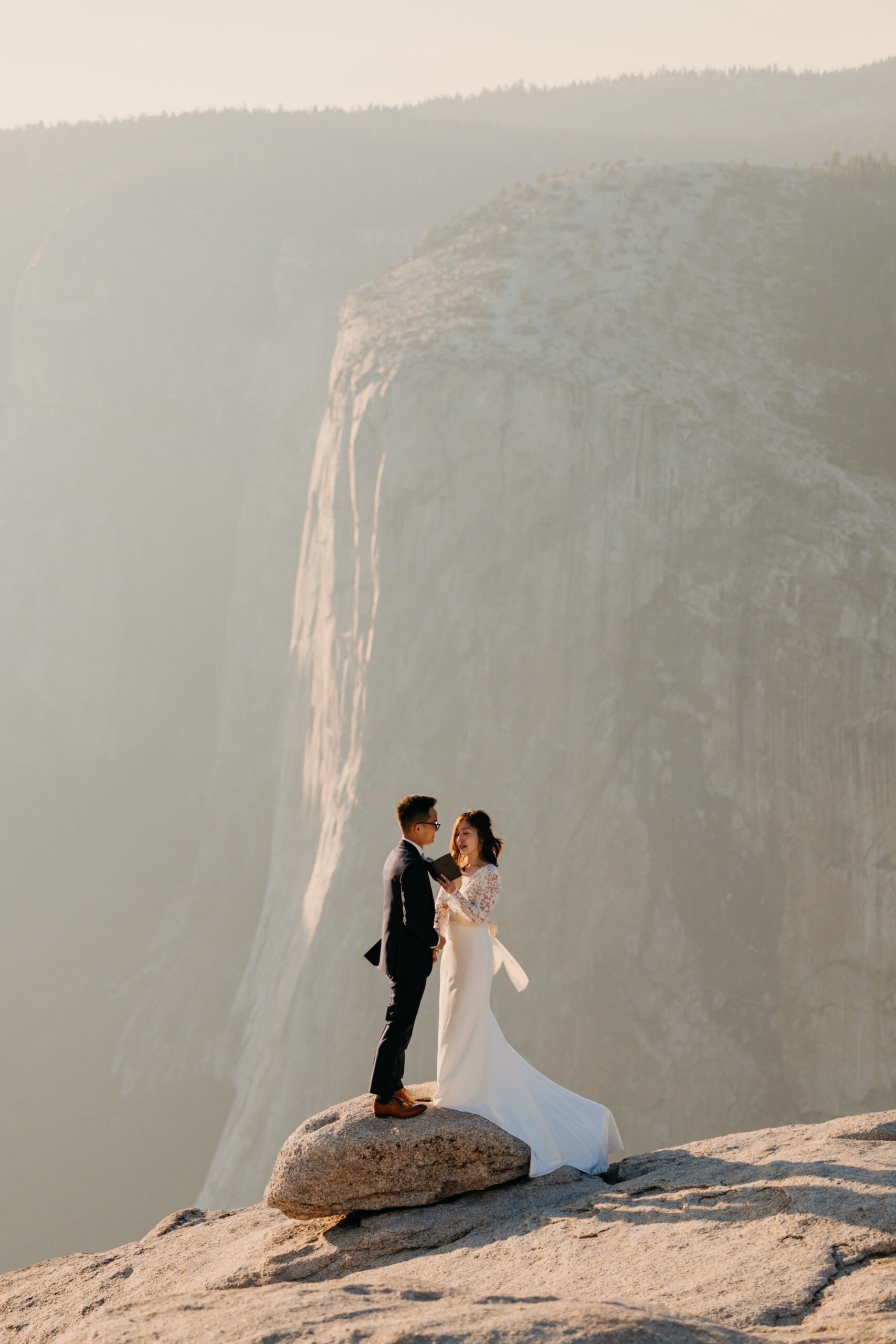 A couple reads their vows to each other during their Yosemite Wedding.