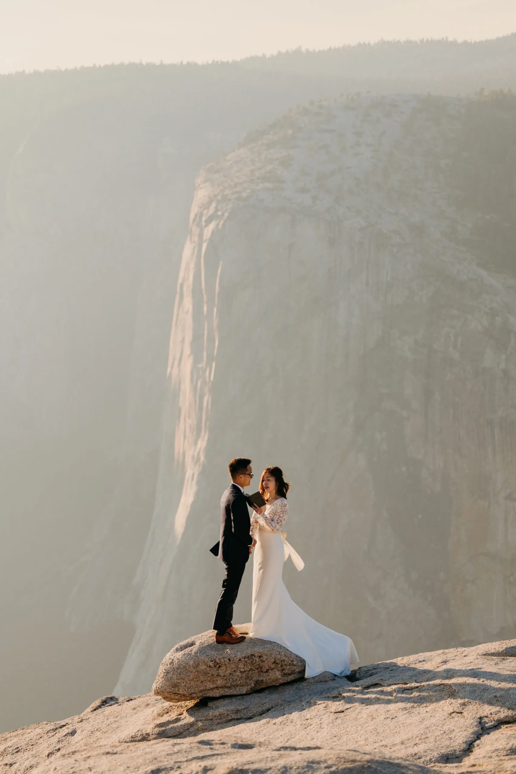 A couple reads their vows to each other during their Yosemite Wedding.