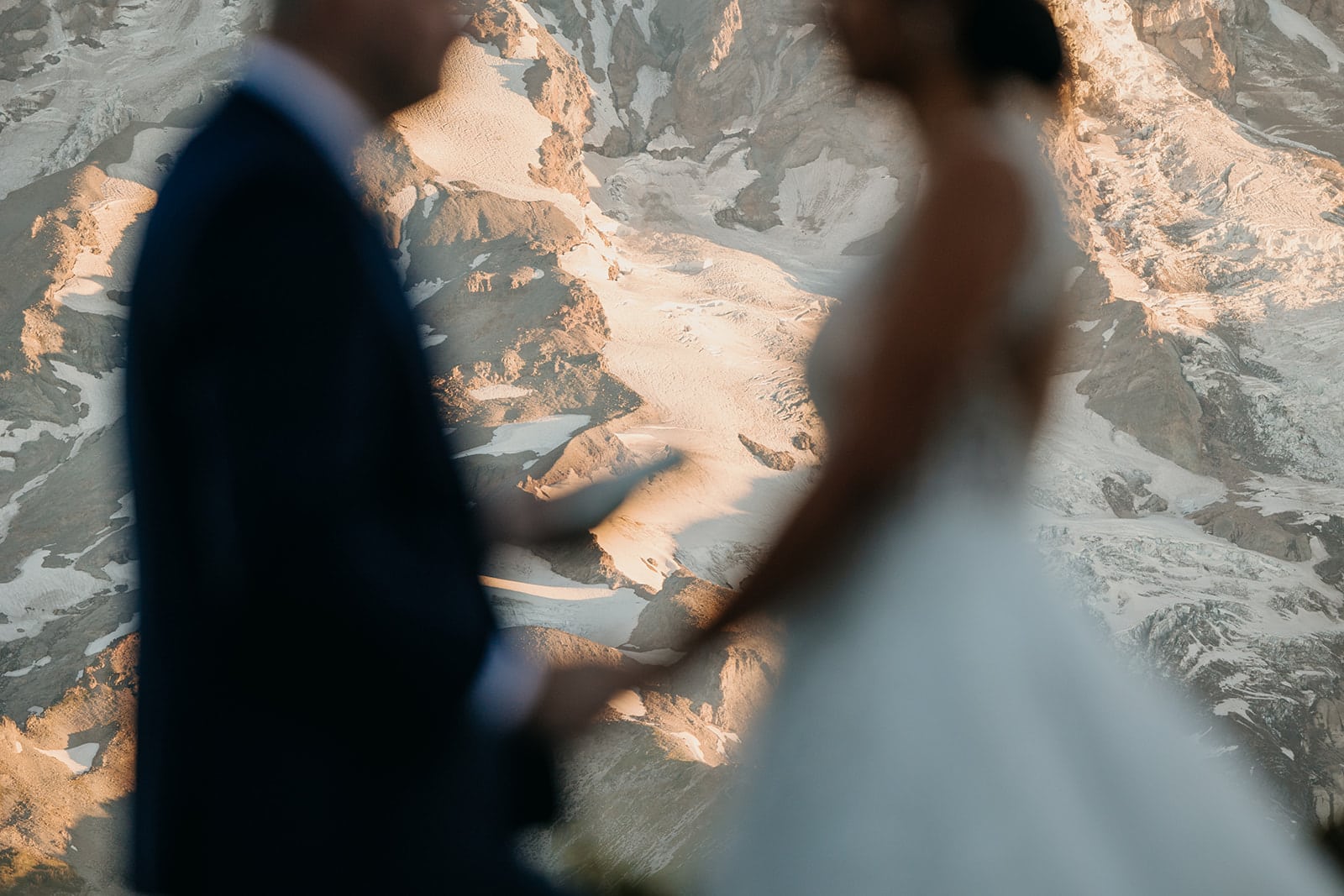 The glaciers on the mountain as the couple reads their vows.
