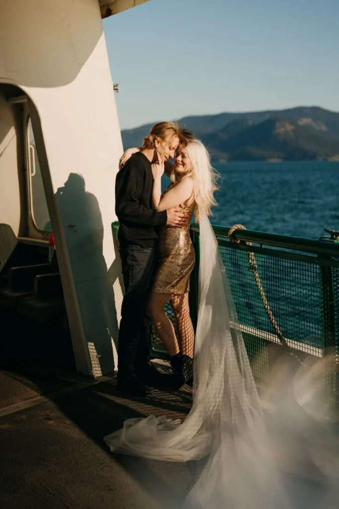 A couple holds each other on the Washington Ferry.