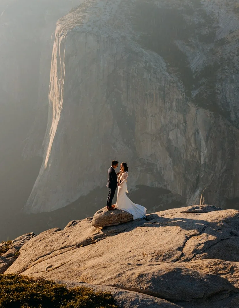 A couple shares their vows at Taft Point in Yosemite.