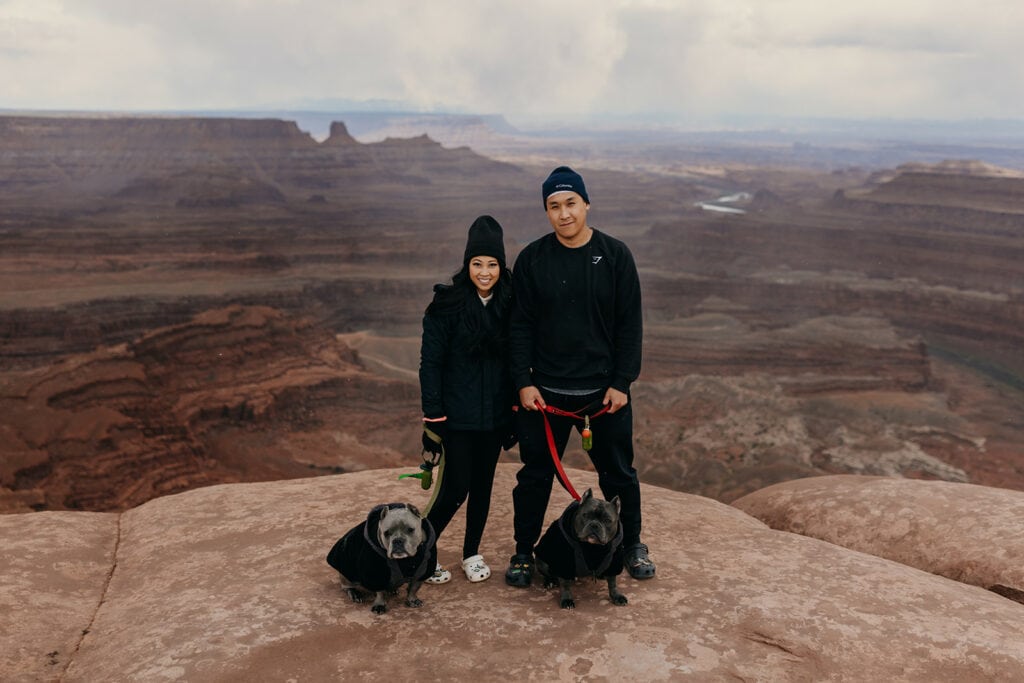 A portrait of the couple and their dogs.