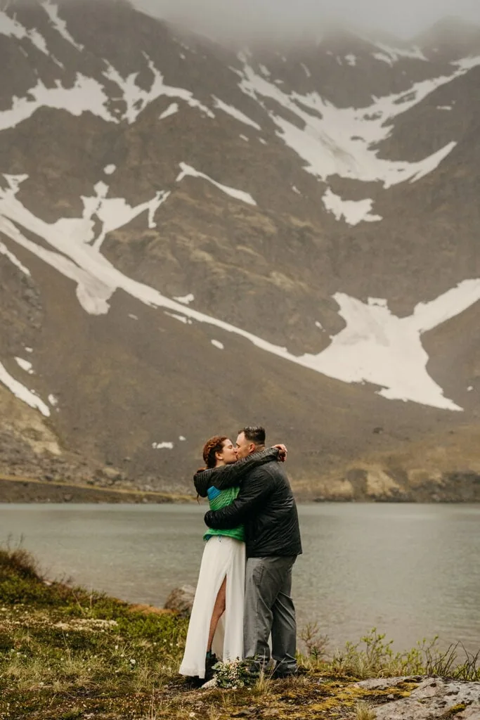 The couple shares their first kiss married.