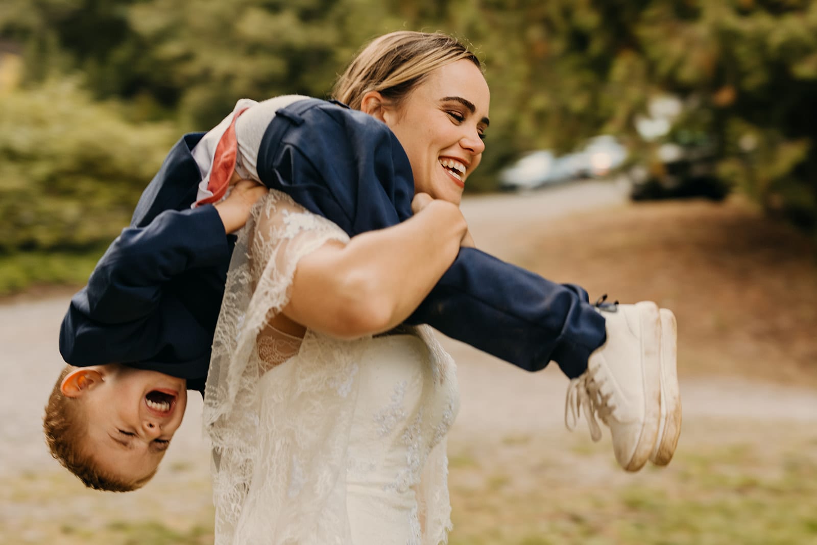 The bride carries her nephew.