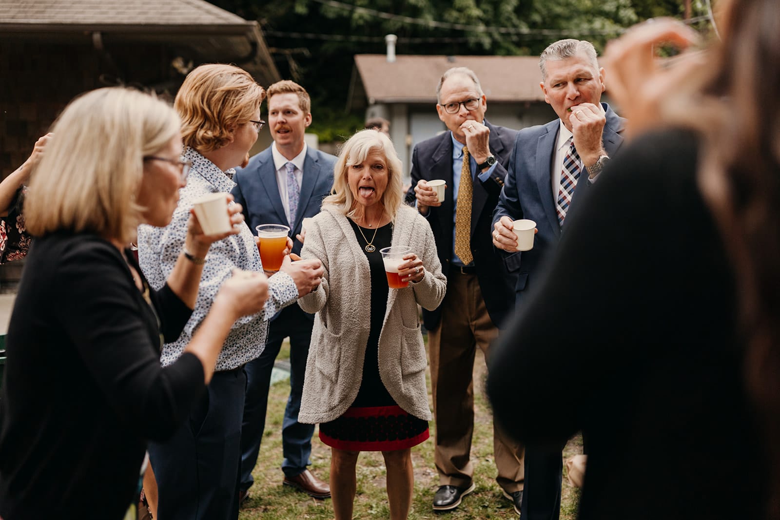 Mom takes a shot with other guests.