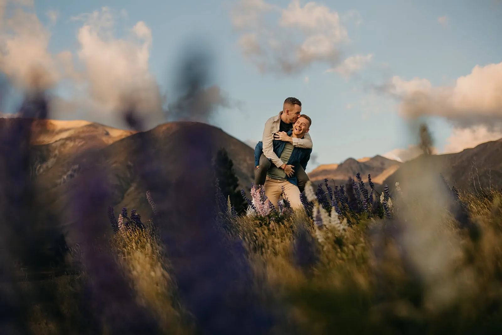 Newly engaged couple in the lupine fields.