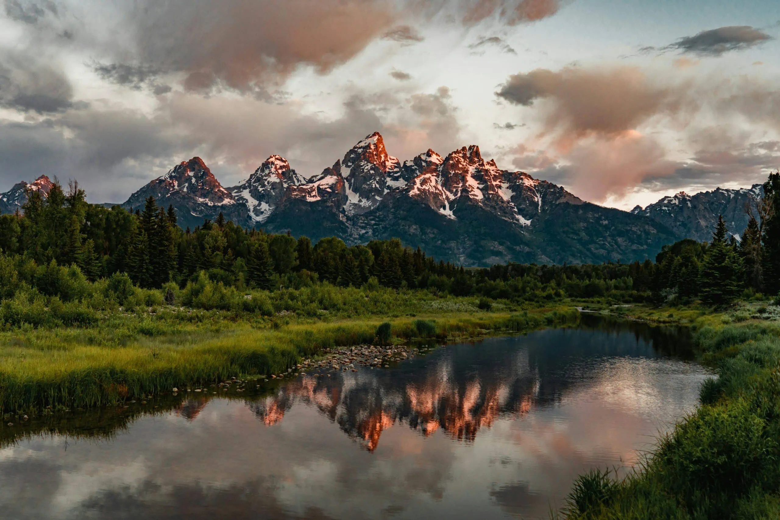 A view of the mountains at sunset in Grand Tetons National Park.